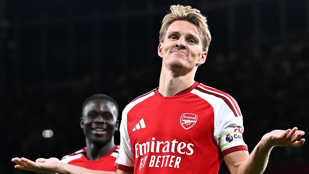 Skuad Arsenal merayakan kemenangan di Emirates Stadium